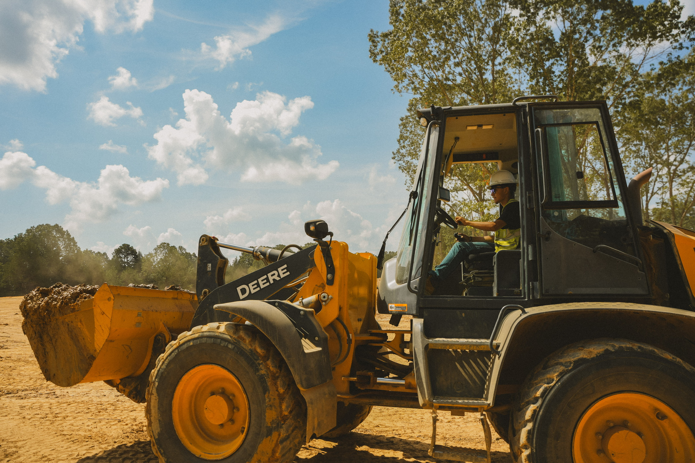 Wheel loader moving materials